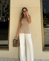 Laura M.